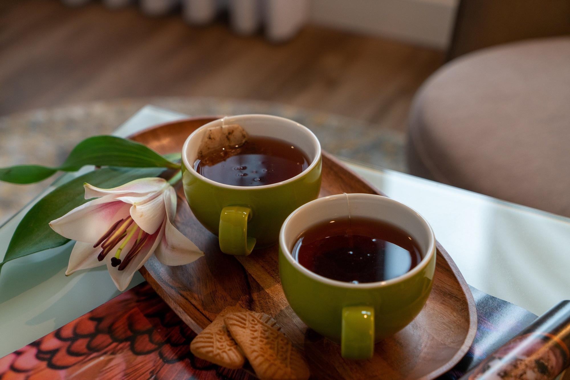 特拉维夫莱昂纳多城市大厦酒店 Giv'atayim 外观 照片 Two cups of tea